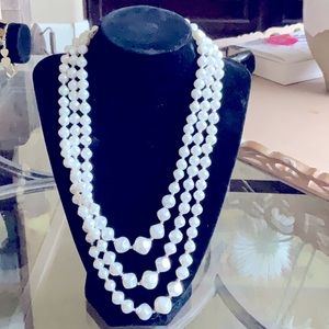 Fashion jewelry with 3 strands of imitation pearls can go dressy or casual.